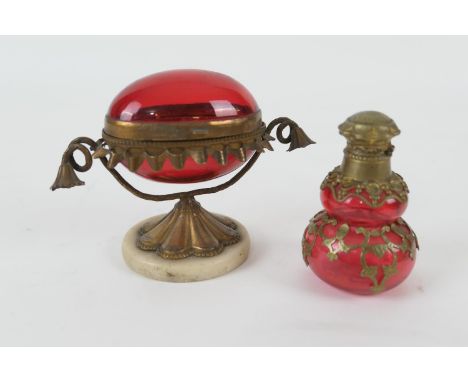 French double gourd ruby glass scent bottle, mounted in brass, circa 1900, height 17cm; also a French brass mounted ruby glas