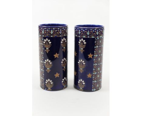 Pair of French blue and enamel jewelled cylinder vases, marked 'BFK', height 12.5cm 