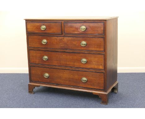 Late George III oak and mahogany banded chest of drawers, fitted with two short and three long graduating drawers, with later