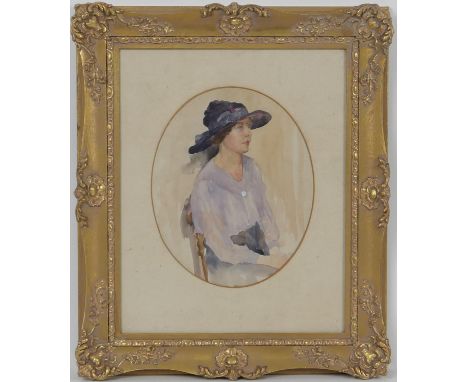 Edwardian School, Portrait of a lady seated in a wide brimmed hat, watercolour, oval, 26cm x 21cm 