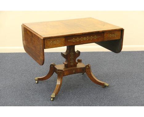 Good Regency rosewood and brass inlaid sofa table, circa 1810-20, well figured top with two drop leaves and bordered with tra