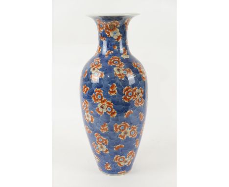 Chinese clobbered blue and white vase, late 19th Century, decorated with prunus blossom, and later painted in terracotta agai