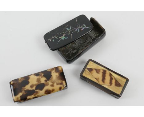 Two tortoiseshell and horn snuff boxes, 19th Century, the largest 8cm x 3.5cm, also a Victorian black lacquered papier mache 