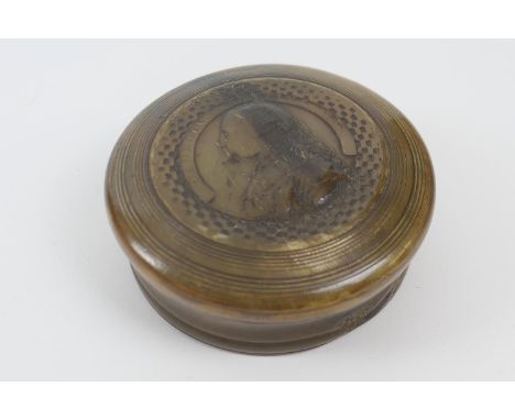 Georgian pressed horn snuff box, circa 1760, circular form, the cover with a profile of George III and the motto 'Georgivs Te