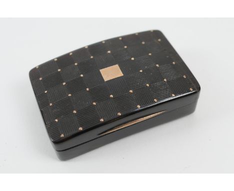 Tortoiseshell and gold studded snuff box, early 19th Century, curved rectangular form, the hinged cover decorated in a cheque