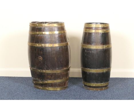 Victorian oak coopered barrel, converted to a stick stand, metal bound, height 62cm; also a further oak coopered stick stand,