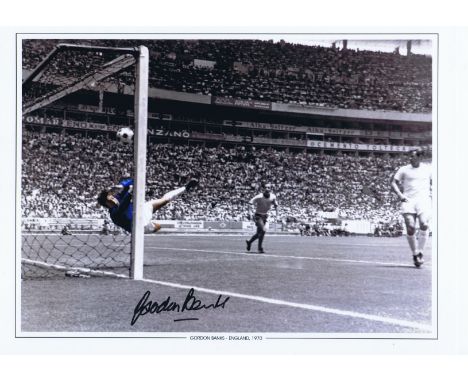Autographed GORDON BANKS 16 x 12 Edition : England goalkeeper GORDON BANKS makes an incredible save from Pele's downward head