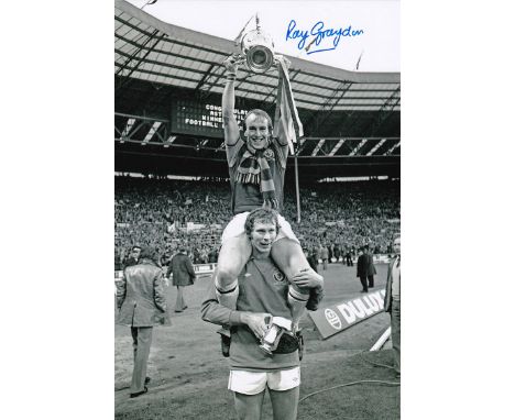 Autographed RAY GRAYDON 12 x 8 photo : B/W, depicting Aston Villa's RAY GRAYDON (on the shoulders of team mate Jim Cumbes) ho