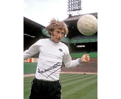 Autographed COLIN TODD 16 x 12 Photo : Derby County centre-half COLIN TODD demonstrating his heading technique for photograph