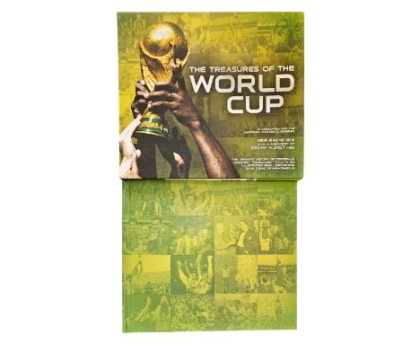 Hard back book Treasures of the World Cup by Keir Radnedge and a foreword by Geoff Hurst MBE. Good condition. All autographs 