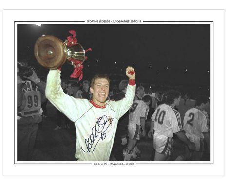 Autographed LEE SHARPE 16 x 12 Edition : Manchester United winger LEE SHARPE holds aloft the European Cup Winners Cup during 