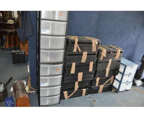 ELEVEN PLASTIC SHELVING UNITS with four levels and pipe work to each width 60cm depth 30cm, along with two four drawer and on