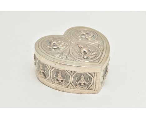 A HEART SHAPED INDIAN TRINKET BOX, with embossed seated deity figures to the lid and sides, unmarked, approximate length 85mm