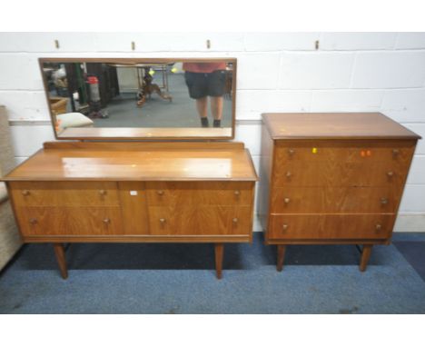 A MID CENTURY TEAK DRESSING TABLE, with a rectangular mirror, and four drawers, raised on square tapered legs, width 138cm x 