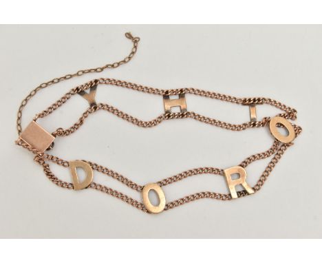 A ROSE METAL NAME CHAIN BRACELET, fine curb link chains applied with the name 'Dorothy', fitted with an integrated box clasp 