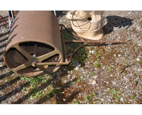 A LARGE VICTORIAN CAST IRON GARDEN ROLLER with 58cm diameter drum ( no wooden handles, pitted rust but appears sturdy