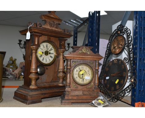 THREE CLOCKS, comprising a large wooden mantel clock with pendulum and key, height 49cm, a smaller mantel clock, height 28cm,