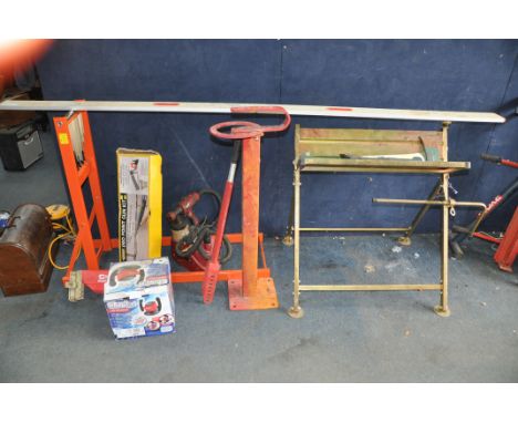 A CLARKE LOG SAW HORSE with chainsaw attachment, a pipe stand, a Clarke paint sprayer, a Clarke car polisher, (both PAT pass 
