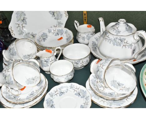 A TWENTY FIVE PIECE ROYAL ALBERT 'SILVER MAPLE' TEA SET AND DINNERWARE, comprising a teapot, a cream jug, a milk jug, two dif