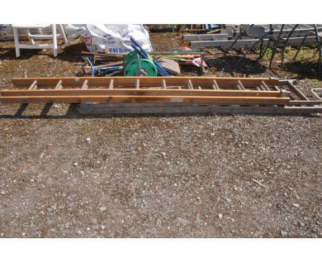 A WOODEN STEP LADDER AND A WOODEN DOUBLE EXTENSION LADDER 273cm long