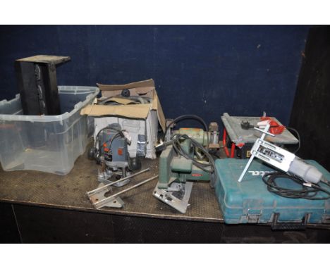 TWO BOXES CONTAINING POWER TOOLS including a Bosch circular saw, a Performance router, a Performance figsaw, a Clarke tile cu