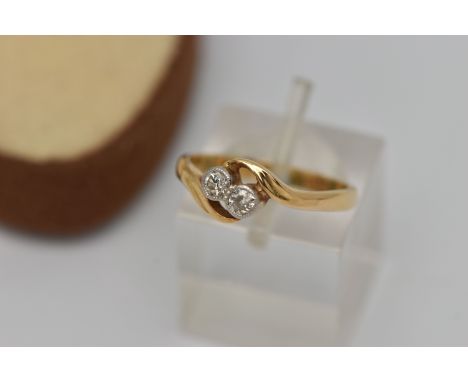 A DIAMOND CROSSOVER RING, designed as two old cut diamonds in millegrain setting to the crossover band, estimated total diamo