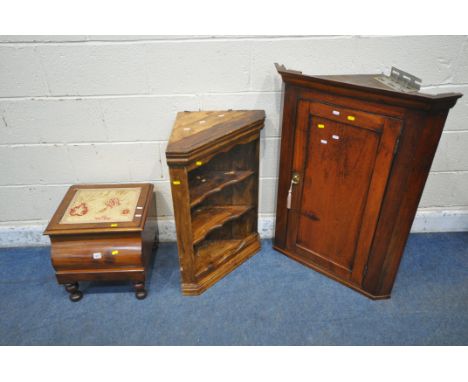 A VICTORIAN MAHOGANY COMMODE, the hinged lid enclosing a ceramic pot, a pull out foot rest, raised on turned legs, width 43cm