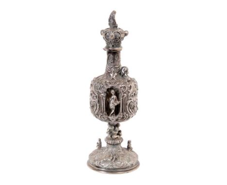 Late 18th/Early 19th century Continental silver Holy Water container of baluster form, with embossed panels containing Holy f