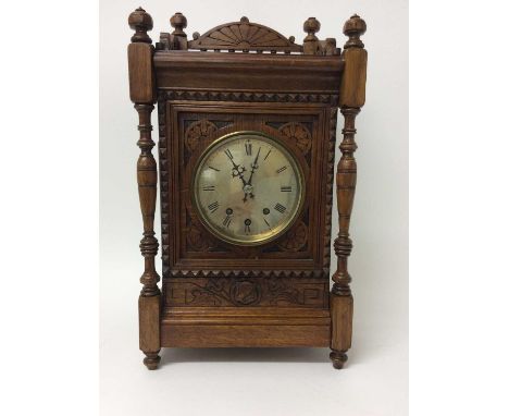 Late 19th century Continental musical bracket clock with silvered dial, the movement with 8 concentric bells and gong in carv