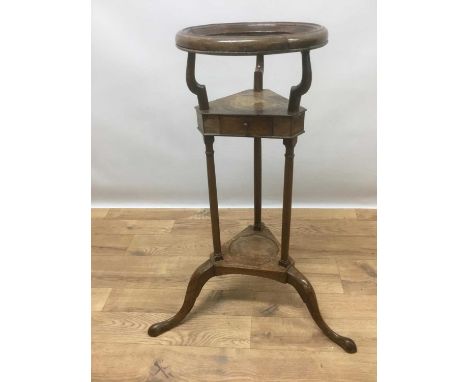 George III mahogany wash stand with dish ring raised over triangular drawer tier, a further tier below and tripod base