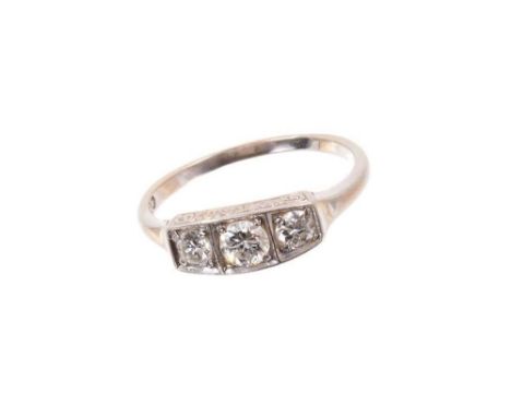 Diamond three stone ring with three old round brilliant cut diamonds in platinum box shape setting on 18ct gold shank. Estima