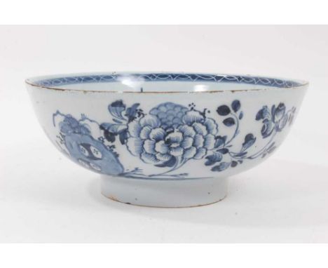 18th century English blue and white delftware bowl, painted with flowers in the Oriental style, 22.5cm diameterProvenance: Ga
