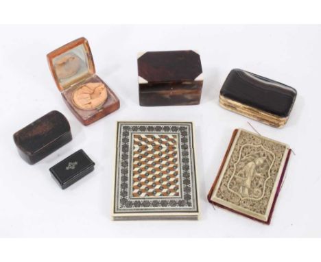 Collection of antique boxes, including agate and brass snuff box, sandalwood card case, and other snuff boxes. (7)