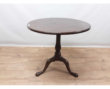 George III mahogany tripod wine table, the snap-top on shaped columns and three splayed legs, 73cm diameter x 68cm high