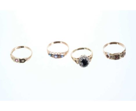 Four gold and gem-set dress rings to include an Edwardian sapphire and diamond ring in rose gold setting, blue sapphire and d