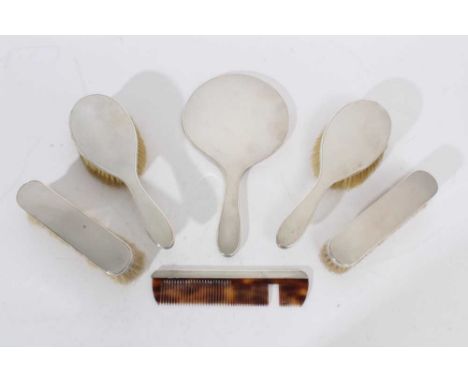 Group of 1960s silver mounted dressing table items, with engine turned decoration comprising, a pair hair brushes and a match
