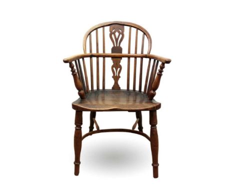 19th century yew and elm Windsor chair, stick back with pierced splat and solid seat on turned legs and crinoline stretcher 