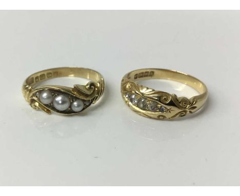 Two antique 18ct gold rings to include a late Victorian diamond five stone ring with carved gold setting, Birmingham 1900, si