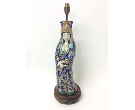Japanese ceramic figural lamp, raised on wooden pieced base, total height 58cm