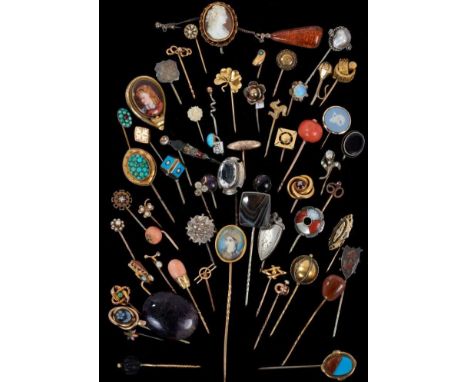 A good collection of antique stick pins to include Victorian and later stick pins, an Indian portrait miniature stick pin, Sc