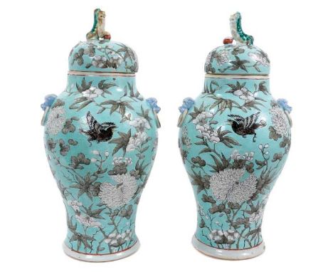 Pair of Chinese porcelain baluster vases and covers, late Qing period, decorated in the Dayazhai style with flowers and birds