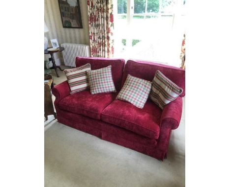 Good quality hand-made two seater sofa upholstered in Colefax &amp; Fowler red fabric, with loose cushions, approximately 190