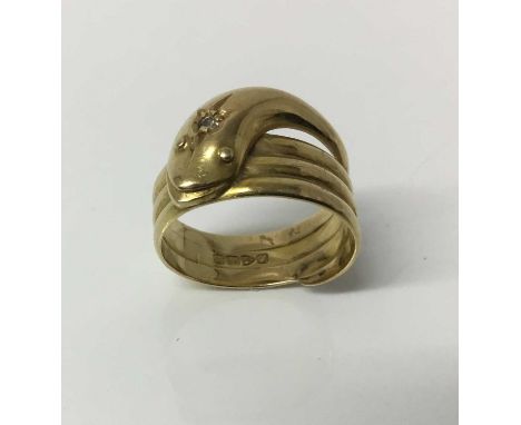 Early 20th century 18ct gold snake ring with single cut diamond to the head and gold coiled body, Chester 1918, ring size app