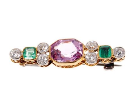 Edwardian pink topaz, diamond and emerald brooch of suffragette interest, with central octagonal step cut pink topaz measurin