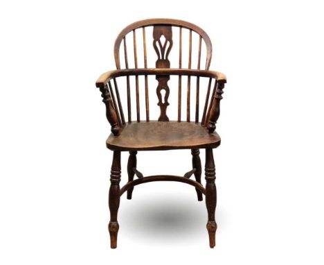 19th century ash and elm Windsor chair, arched stick back with pierced vase shaped splat on turned legs and crinoline stretch