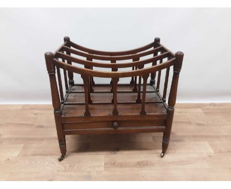 Regency mahogany canterbury, with bowed divisions and drawer below on ring turned legs and castors, 53cm wide