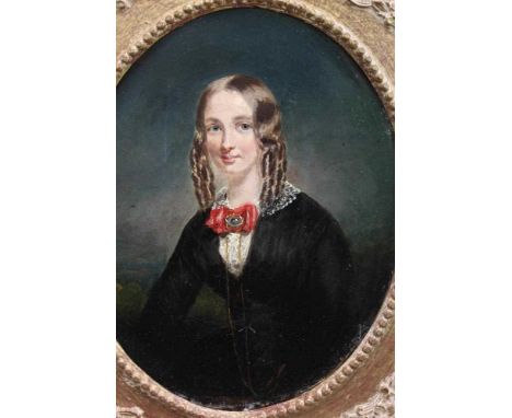19th century English School, oil on canvas, A three quarter length portrait of a young lady with ringlets, oval, 26cm x 20cm,