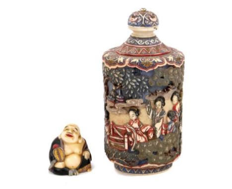 Finely carved and polychrome stained Chinese ivory snuff bottle and cover, finely carved with continuous frieze of figures in