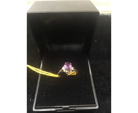 A 9ct amethyst and diamond ring