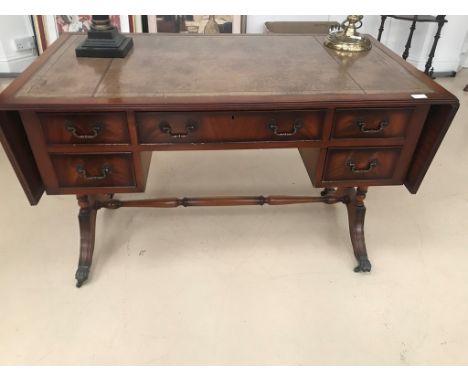 A Regency-style leather-topped mahogany sofa table